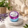 Toples biru Ihsas Raed Lavender Cream كريم لافندر dengan tutup ungu metalik yang sangat bermanfaat untuk melembapkan kulit kering, melembutkan rambut kusut, dan memberikan efek relaksasi aromaterapi dari keharuman bunga lavender.